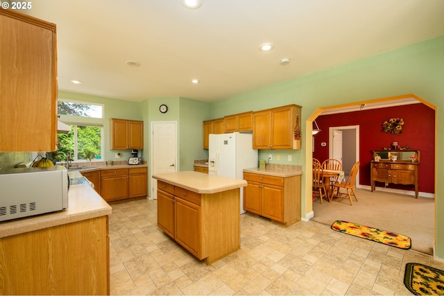 982 Reston Rd, Roseburg, OR 97471 - kitchen featuring white microwave, a sink, light countertops, a center island, and recessed lighting