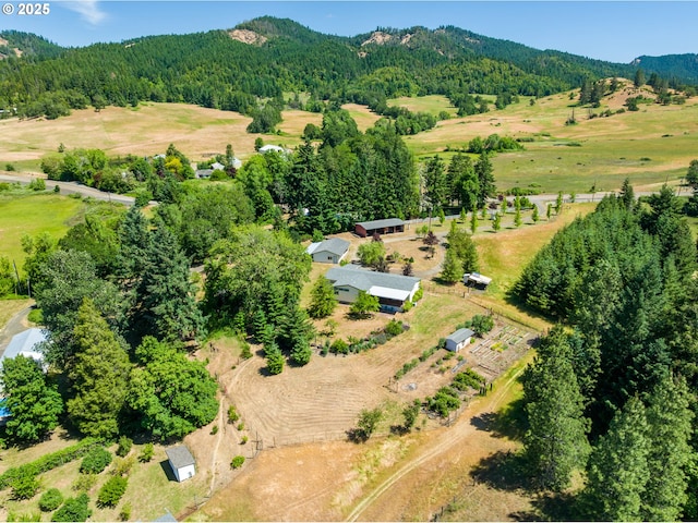 982 Reston Rd, Roseburg, OR 97471 - aerial view of property's location with a heavily wooded area, mountains, and rural landscape