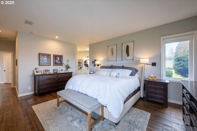 33685 Van Duyn Rd, Eugene, OR 97408 - bedroom with dark wood finished floors, baseboards, recessed lighting, and ensuite bath