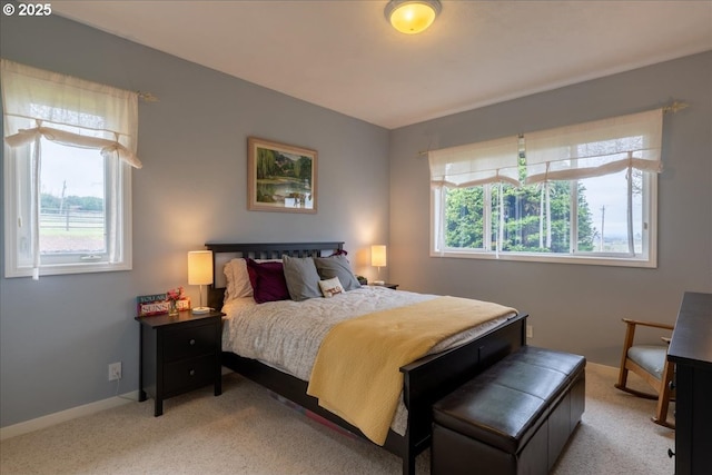 33685 Van Duyn Rd, Eugene, OR 97408 - carpeted bedroom featuring multiple windows and baseboards