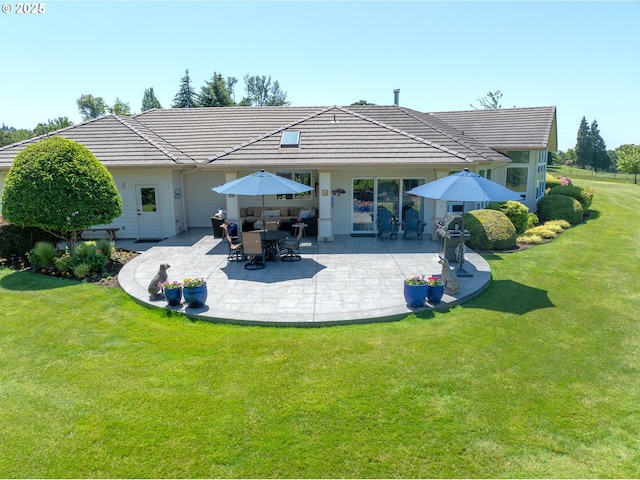 33685 Van Duyn Rd, Eugene, OR 97408 - rear view of house with a patio, a lawn, and a tile roof
