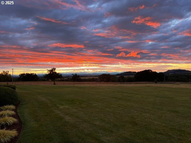 33685 Van Duyn Rd, Eugene, OR 97408 - yard at dusk with a yard and a view of countryside