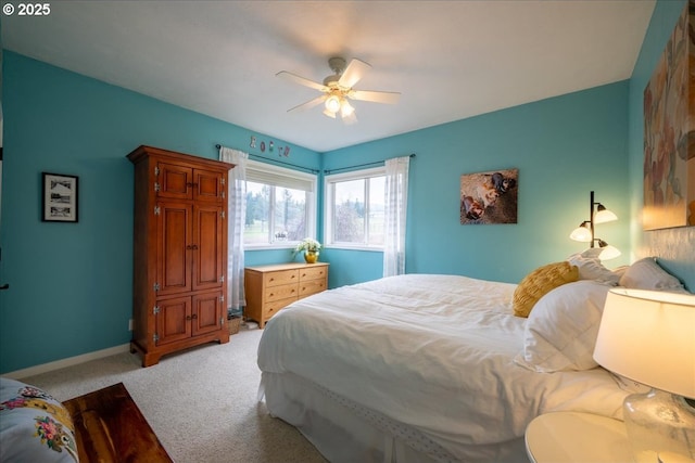 33685 Van Duyn Rd, Eugene, OR 97408 - bedroom with light carpet, baseboards, and a ceiling fan
