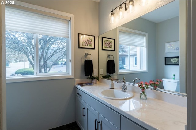 33685 Van Duyn Rd, Eugene, OR 97408 - bathroom with vanity, toilet, and baseboards