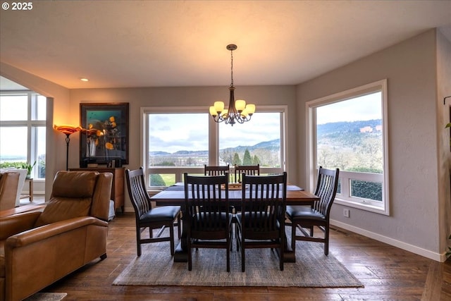 33685 Van Duyn Rd, Eugene, OR 97408 - dining area featuring a chandelier, a mountain view, baseboards, dark wood-style floors, and recessed lighting