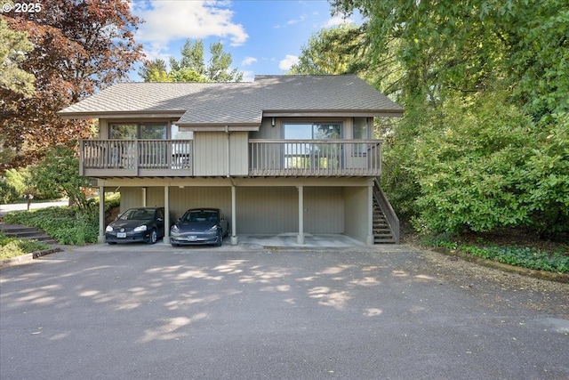 7752 SW Barnes Rd Unit B, Portland, OR 97225 - view of front of house featuring stairway and a wooden deck