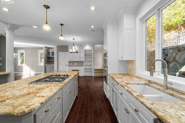 kitchen with stainless steel appliances, recessed lighting, a wealth of natural light, and a sink