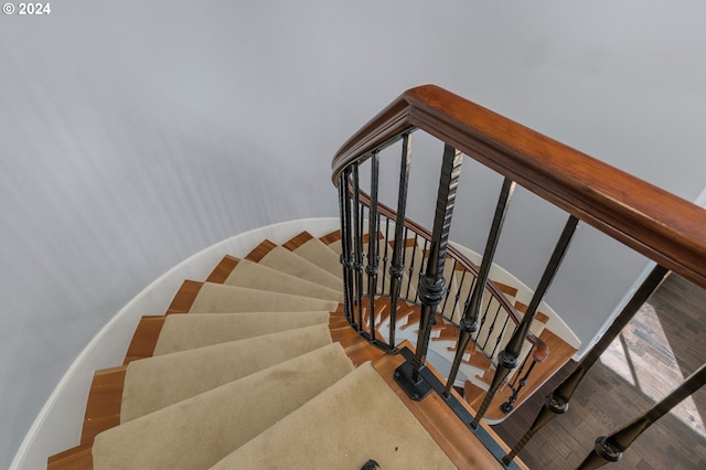 stairs with wood finished floors