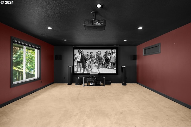 home theater room featuring carpet floors, recessed lighting, and baseboards