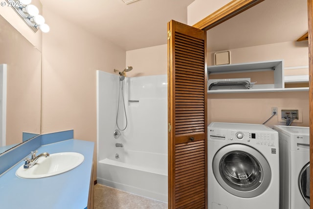 15210 SW 100th Ave, Portland, OR 97224 - full bathroom featuring  shower combination, washer and clothes dryer, vanity, and tile patterned flooring