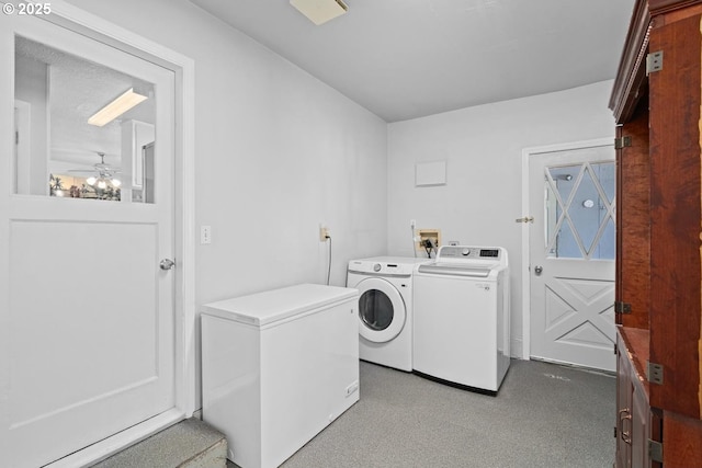 laundry room featuring washer and dryer, laundry area, and a ceiling fan