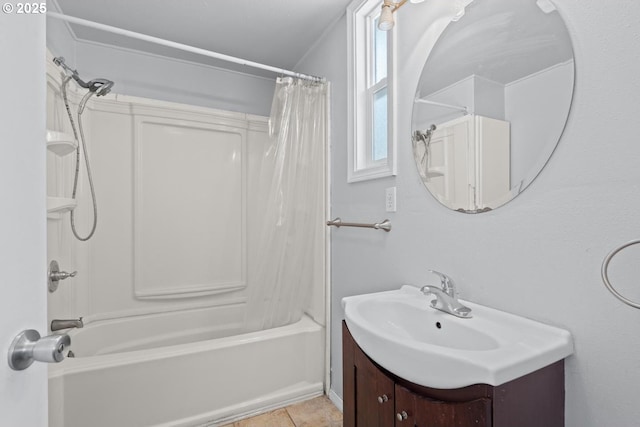 bathroom featuring vanity, tile patterned flooring, and shower / bath combo
