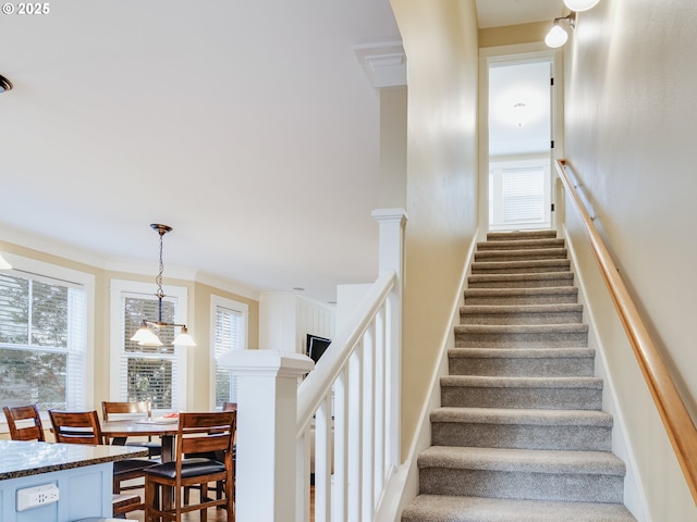 2696 SW Barnacle Ave, Lincoln City, OR 97367 - stairway featuring baseboards and carpet floors