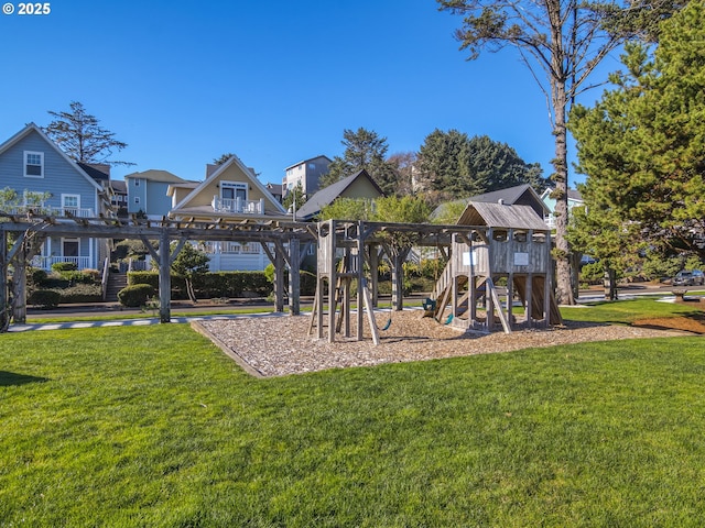 2696 SW Barnacle Ave, Lincoln City, OR 97367 - community play area with a lawn, a pergola, and a residential view