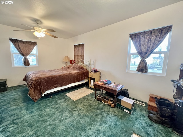 carpeted bedroom with ceiling fan