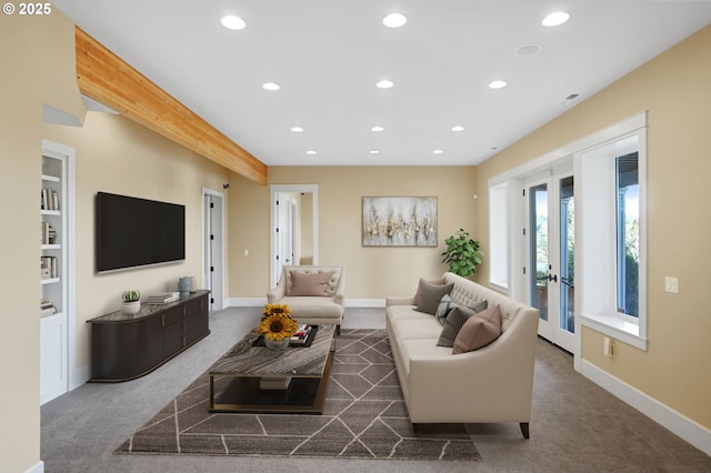 living room with carpet floors, recessed lighting, baseboards, and french doors