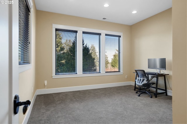 carpeted office space with visible vents, baseboards, and recessed lighting