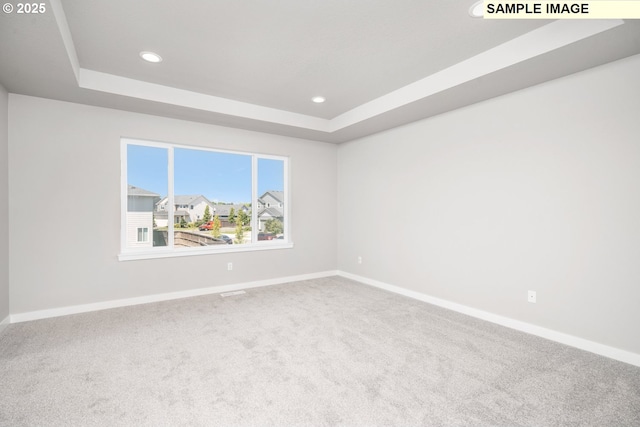 8900 S 1st St Unit 17, Ridgefield, WA 98642 - empty room featuring a tray ceiling, recessed lighting, and carpet floors