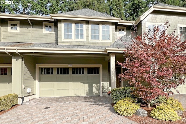 view of front of property with a garage