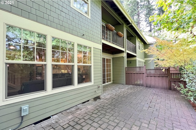 view of home's exterior with a patio