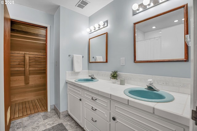 bathroom with double vanity