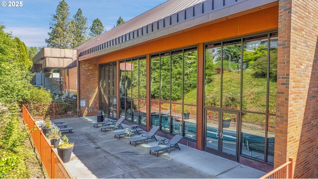 view of patio / terrace featuring fence