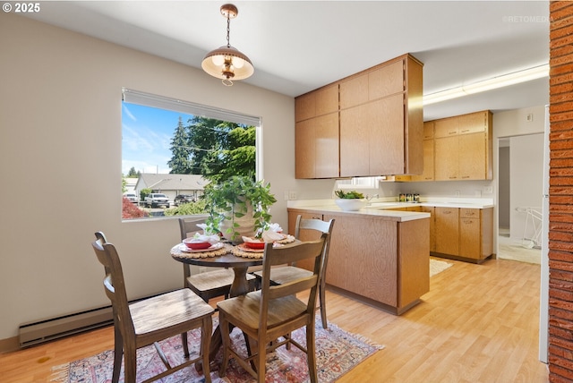 1810 D St, Forest Grove, OR 97116 - dining space featuring a baseboard heating unit and light wood-type flooring