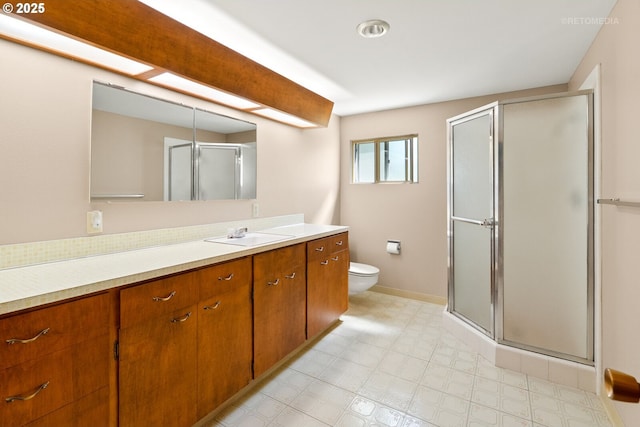 1810 D St, Forest Grove, OR 97116 - full bathroom with vanity, a stall shower, toilet, baseboards, and tile patterned floors