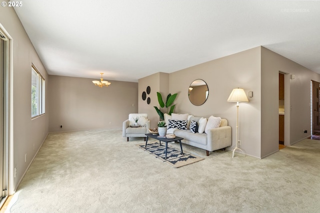 1810 D St, Forest Grove, OR 97116 - carpeted living room featuring a chandelier and baseboards