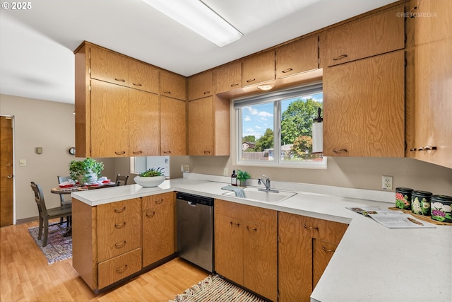 1810 D St, Forest Grove, OR 97116 - kitchen with dishwasher, a sink, light countertops, and light wood-style floors