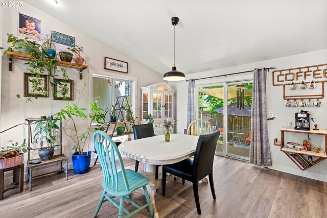 dining area featuring light wood-type flooring