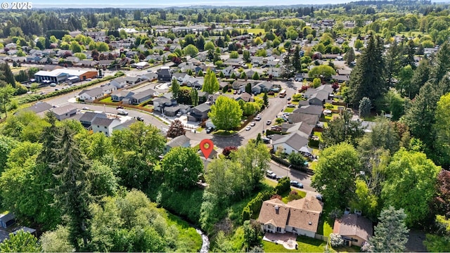 aerial view of property's location featuring nearby suburban area