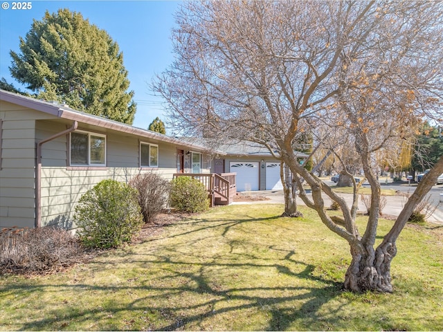 view of yard with a garage