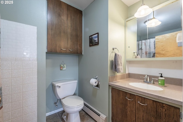 full bathroom with tile patterned flooring, baseboards, toilet, baseboard heating, and vanity