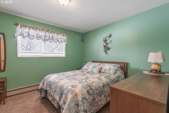 carpeted bedroom featuring baseboard heating