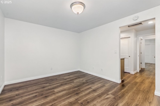 6841 SW Sussex St, Beaverton, OR 97008 - spare room with dark wood-style floors, baseboards, and a smoke detector