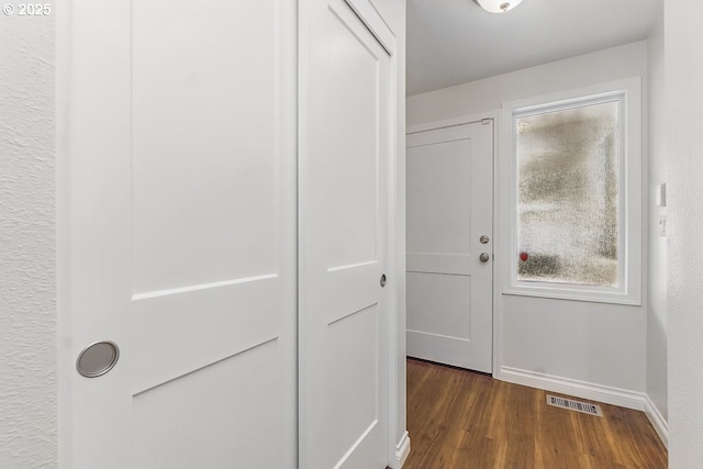 6841 SW Sussex St, Beaverton, OR 97008 - doorway with wood finished floors and baseboards