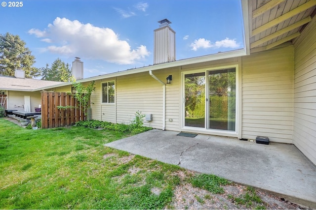 6841 SW Sussex St, Beaverton, OR 97008 - rear view of property featuring a patio and a chimney