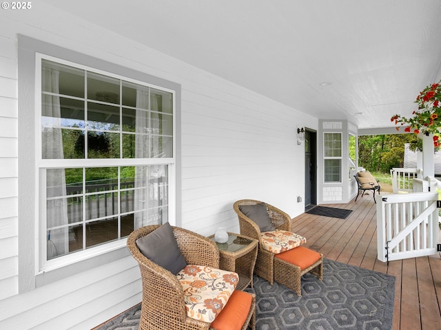 wooden deck featuring a porch