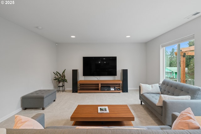 living room featuring light carpet