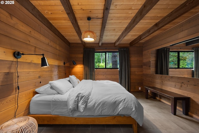 tiled bedroom featuring beamed ceiling, wooden walls, and wood ceiling