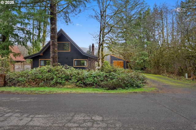 view of front of house with a chimney