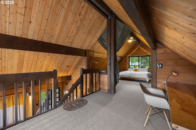 carpeted bedroom with wooden walls, wood ceiling, and vaulted ceiling with beams