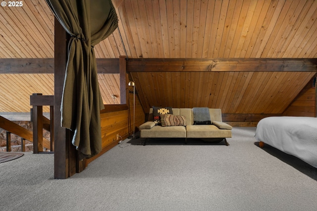 carpeted bedroom with wood walls, wooden ceiling, and vaulted ceiling with beams