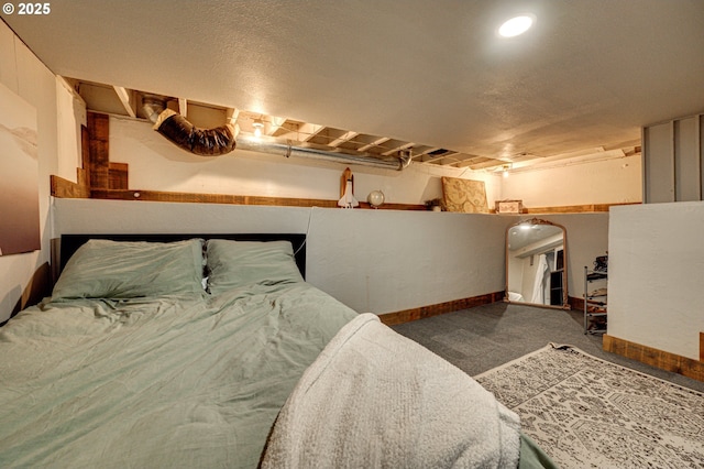 bedroom featuring carpet floors and baseboards