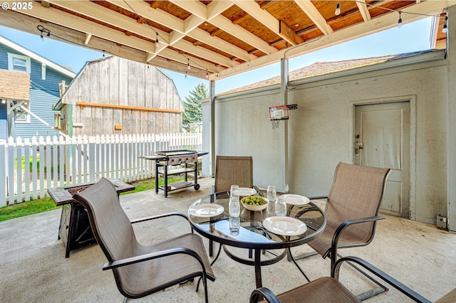 view of patio / terrace with fence and outdoor dining space