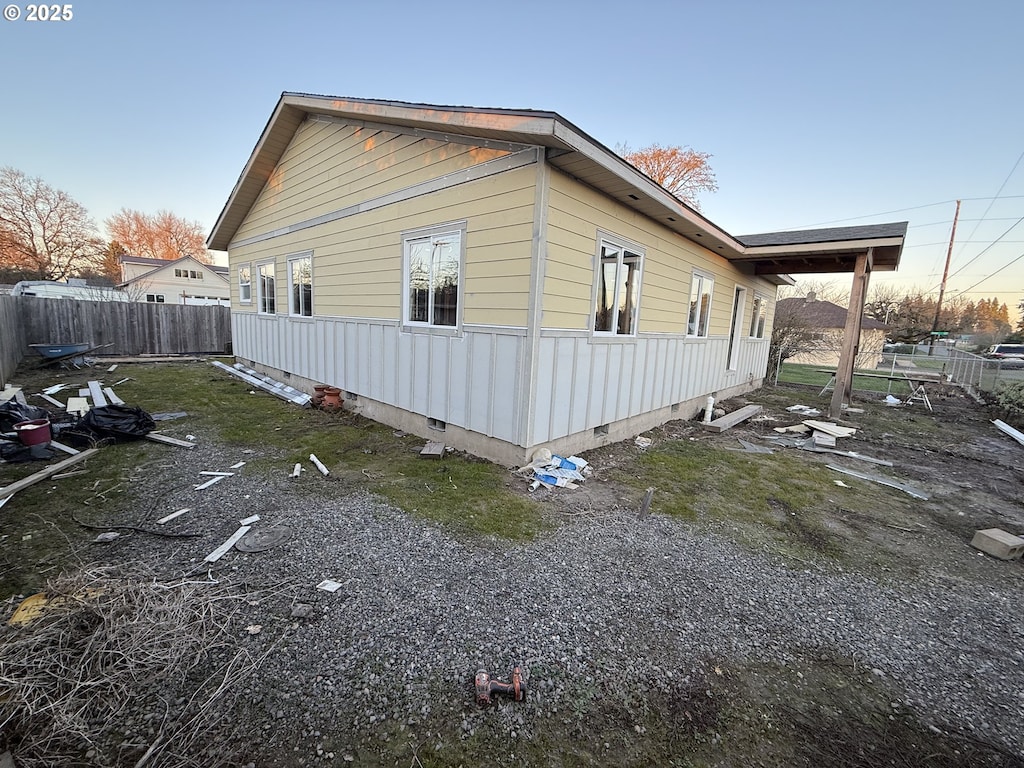 view of property exterior at dusk