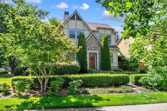 29229 SW Costa Cir E, Wilsonville, OR 97070 - tudor home with stone siding, stucco siding, and a chimney