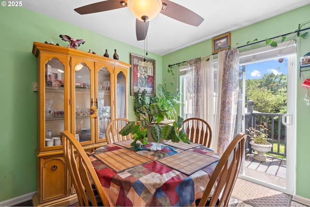 dining space with ceiling fan