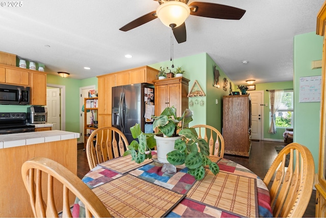 dining room featuring ceiling fan, dark wood finished floors, recessed lighting, and baseboards